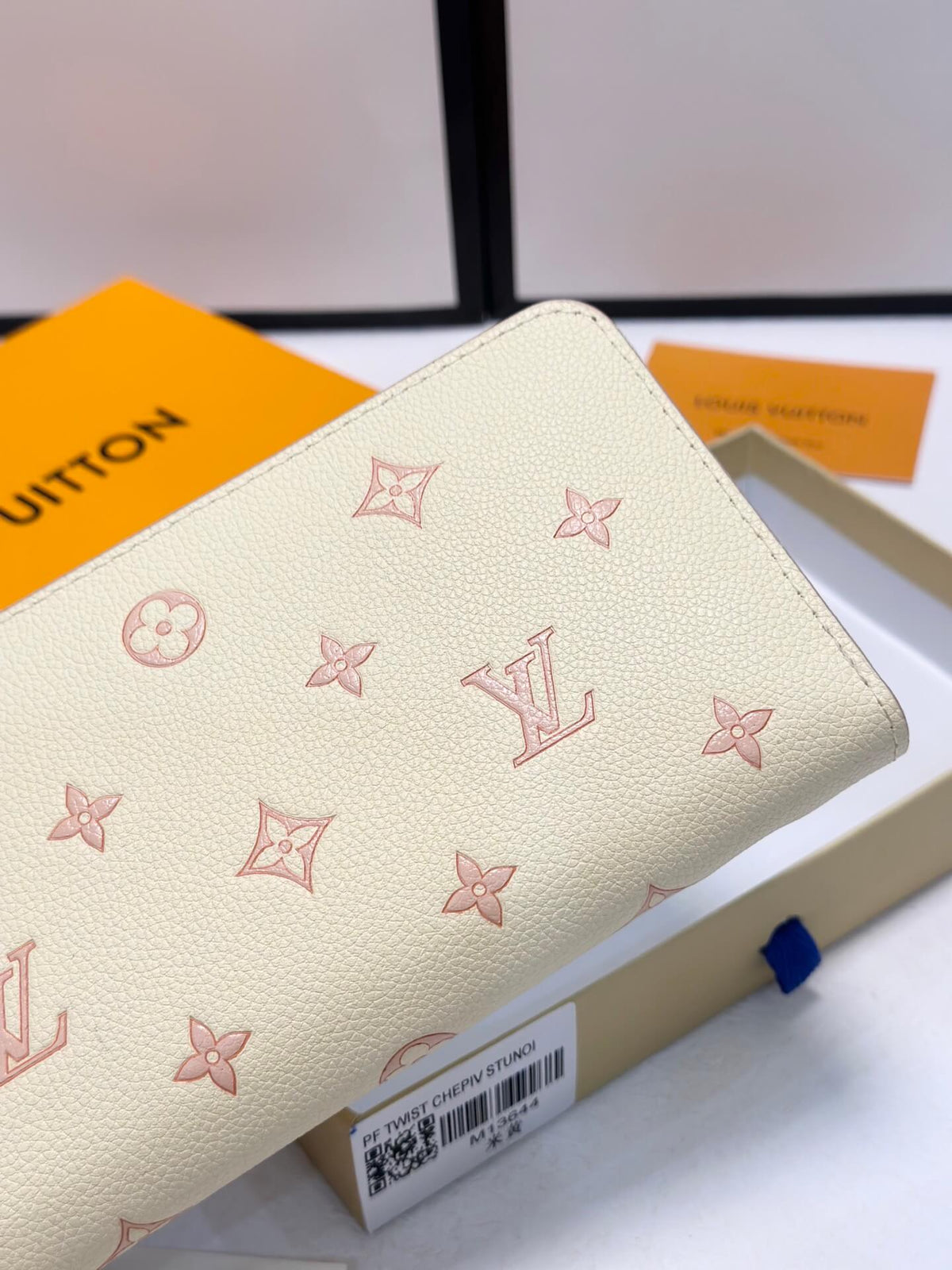Cream Embossed Zip-Around Long Wallet