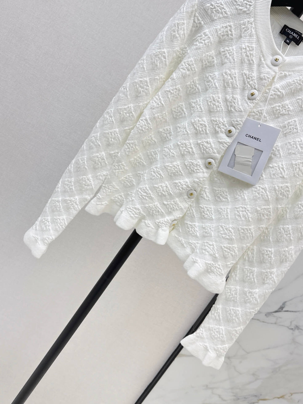 Diamond Jacquard Ruffle Hem Knit Cardigan